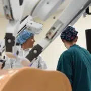 two doctors working on a surgery